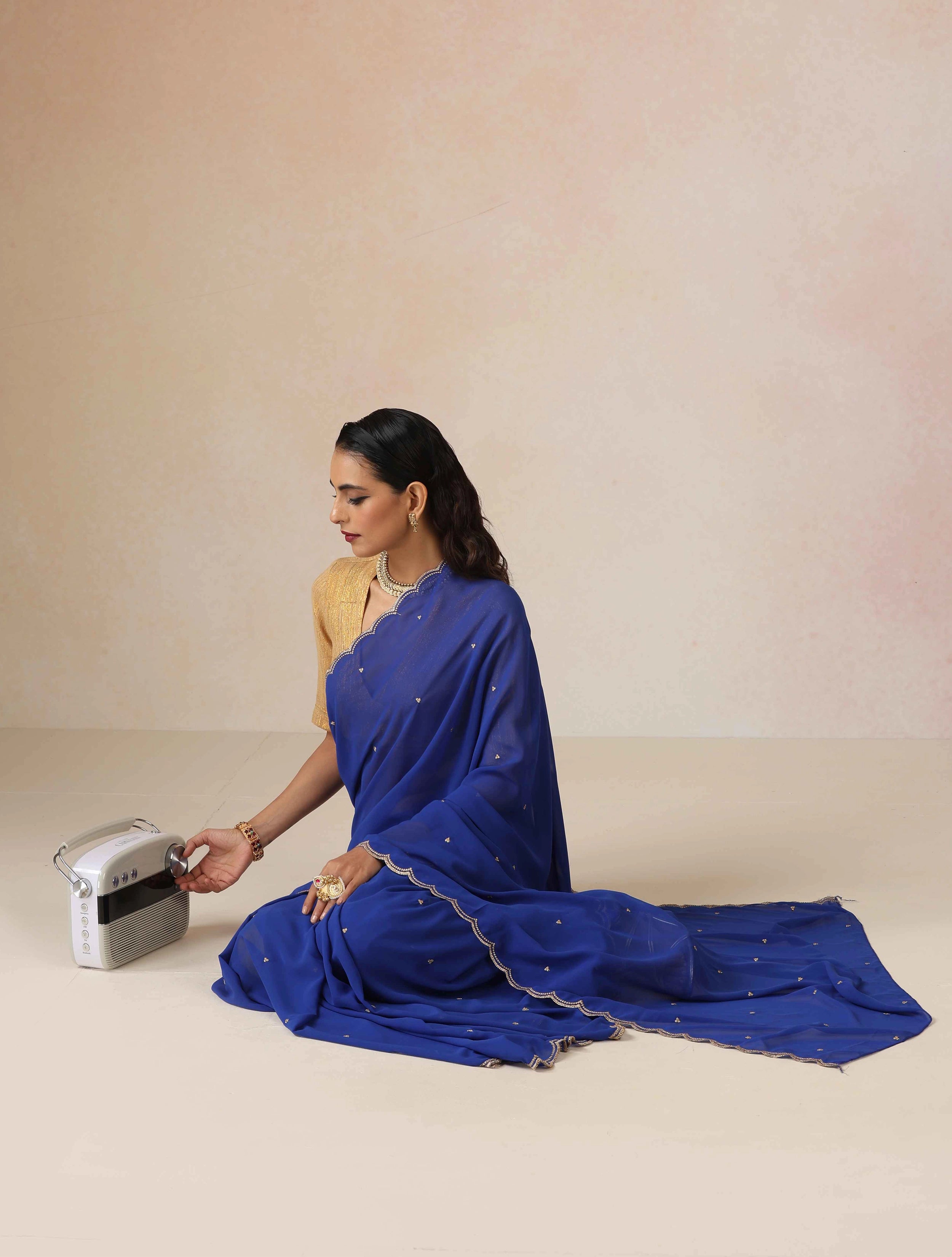 trueBrowns Blue Georgette Embroidered Saree With unstitched Blouse