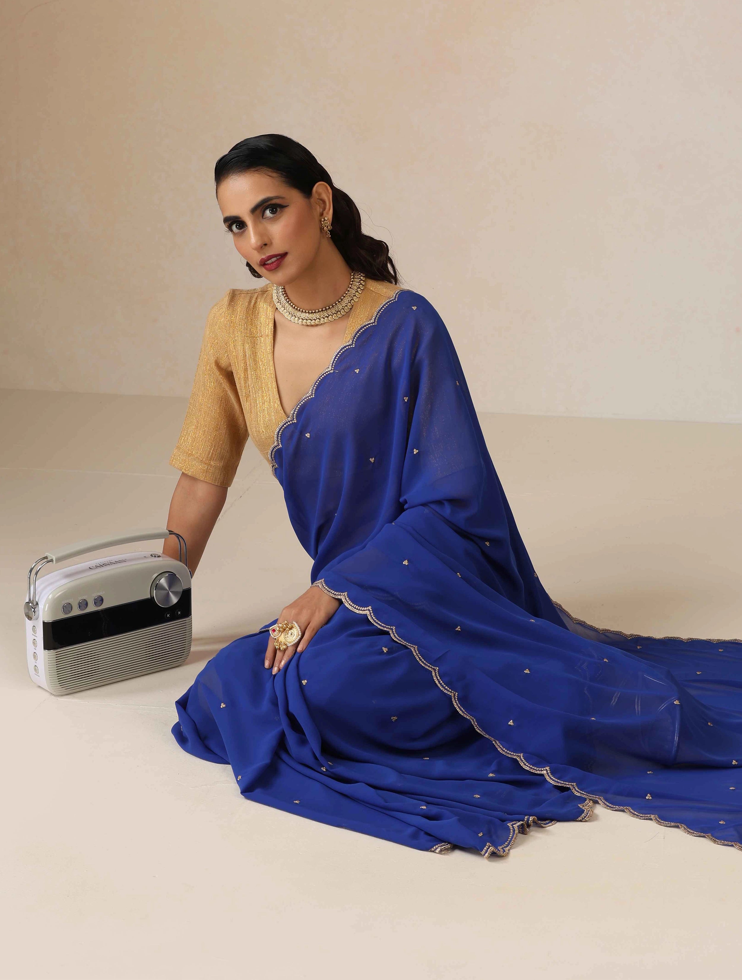 trueBrowns Blue Georgette Embroidered Saree With unstitched Blouse