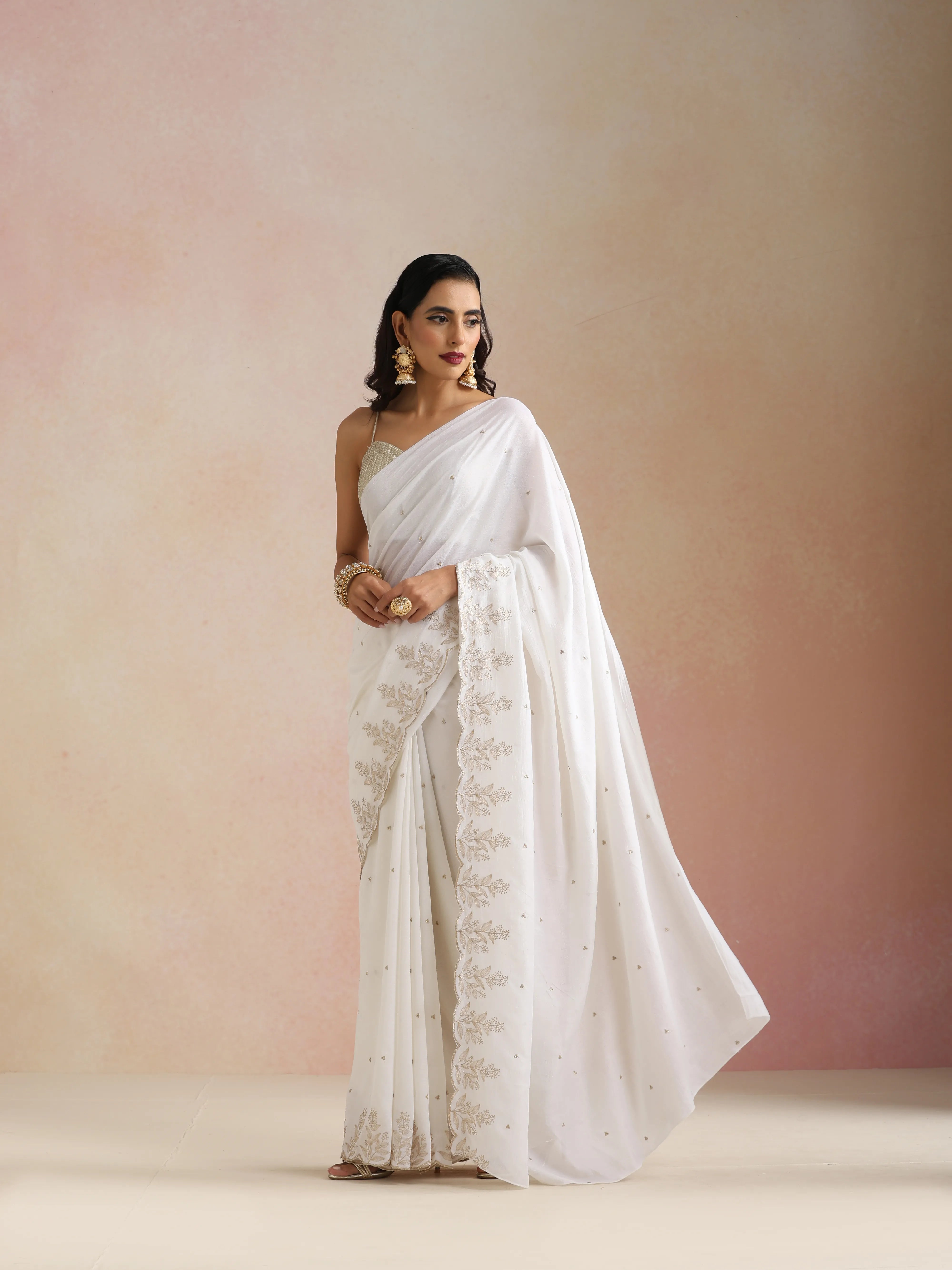 trueBrowns Ivory All Over Zari Embroidered Saree With Unstitched Blouse