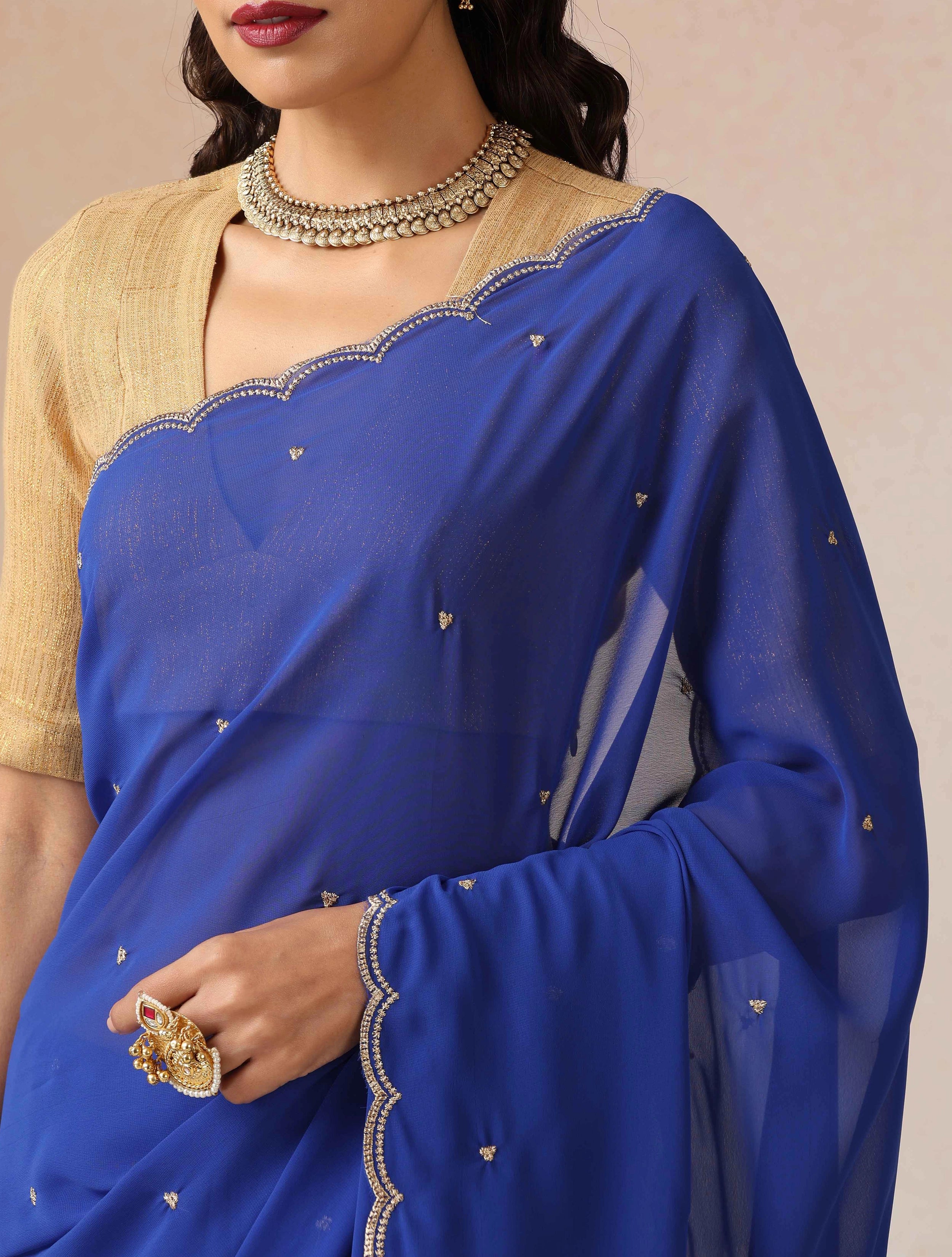 trueBrowns Blue Georgette Embroidered Saree With unstitched Blouse
